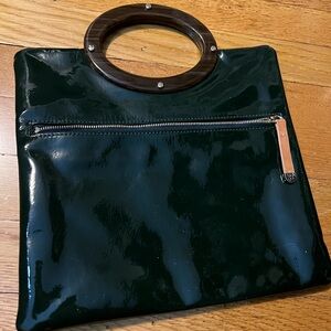 Kate Spade dark green Clutch with Wooden like Handle and Glossy Finish